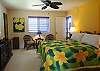 The Plumeria Bedroom has bright Hawaiian decor with a Cal-King size bed and ensuite bathroom