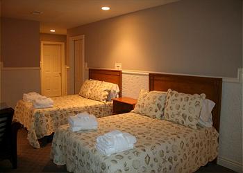 Hilton Head House rental - Interior Photo - Ground Level Double Bedroom with Futon and Foosball