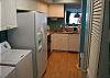 Hilton Head House rental - Interior Photo - Galley Kitchen/ Laundry