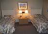 Downstairs bedroom with twins