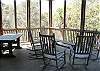 Dewees Island House rental - Interior Photo - Screened Porch with Rocking Chairs