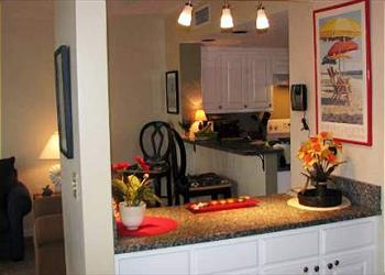 Wild Dunes Condominium rental - Interior Photo - Kitchen and Bar Area