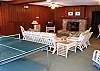 Sullivan's Island House rental - Interior Photo - Downstairs Den with Ping-Pong Table
