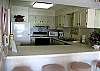 Wild Dunes Condominium rental - Interior Photo - Kitchen and Bar Area