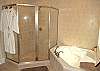 Master Bathroom Tiled Shower and Personal Robes