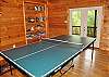 Game Room with Board Games and Ping Pong Table