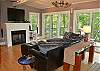 Living Room on Main Level with Fireplace and Flat Screen