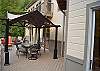Decks with Canopy Dining overlooking River Rapids