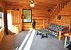 Lower living room with futon sleeper