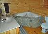 Master Bath with Tub and Rocked Shower