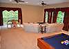 Game Room with Pool Table, Living Area, Card Table,  and Bar