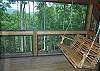 Master Suite balcony with Swing overlooking Year Around Mountain View