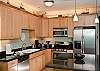 Fully Equipped Gourmet Kitchen With Granite Counter Tops & Stainless Steel Appliances