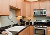 Fully Equipped Gourmet Kitchen With Granite Counter Tops & Stainless Steel Appliances