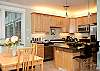 Fully Equipped Gourmet Kitchen With Granite Counter Tops & Stainless Steel Appliances