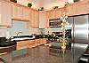 Fully Equipped Gourmet Kitchen With Granite Counter Tops & Stainless Steel Appliances