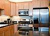 Fully Equipped Gourmet Kitchen With Granite Counter Tops & Stainless Steel Appliances