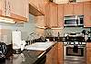 Fully Equipped Gourmet Kitchen With Granite Counter Tops & Stainless Steel Appliances
