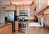 Fully Equipped Gourmet Kitchen With Granite Counter Tops & Stainless Steel Appliances