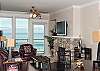 Unwind In Comfortable Elegance With a Plasma TV and River Rock Fireplace