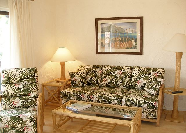 Bright living room with a queen sleeper sofa.