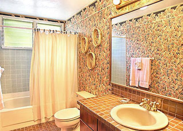 One of three bathrooms