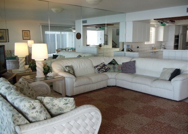 Spacious living room with new tile and an ocean view!