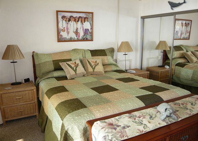 Master bedroom with a Cal-King bed, full ocean view & adjoining 