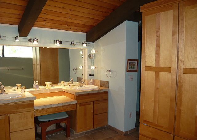 Loft bathroom with a full shower stall.