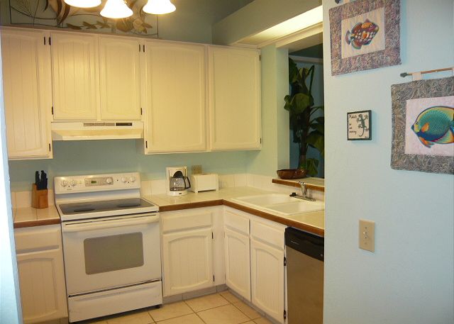 Kitchen which is fully furnished.