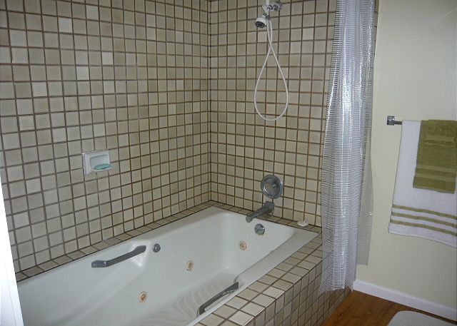 Large tub off the bedroom.