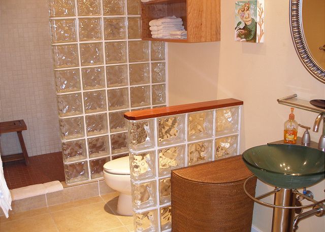 Beautifully tiled bath with a large shower