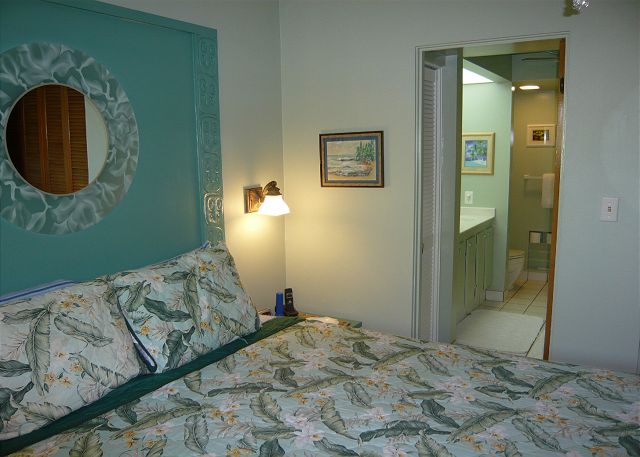 Bedroom with a king bed and adjoining bathroom