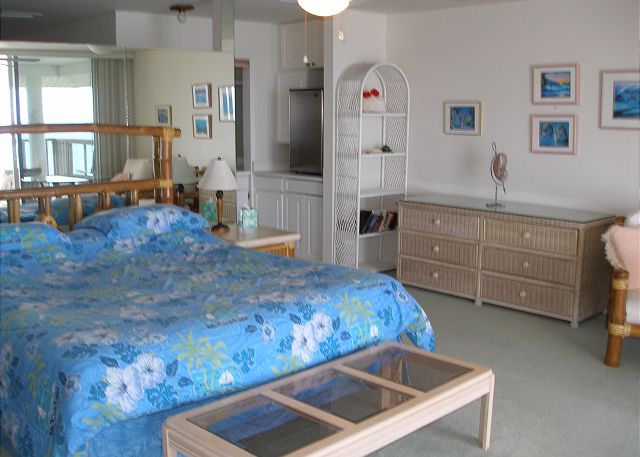 Master bedroom with microwave and mini fridge