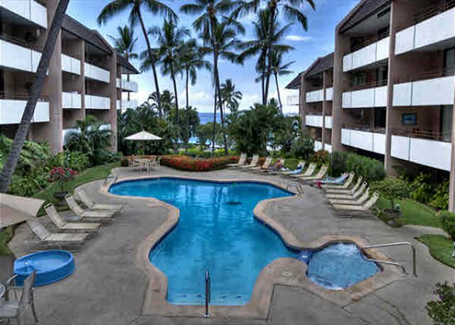 Pool and ocean view at the court yard of this complex.