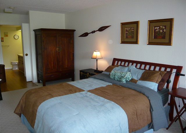 Queen bed in this large bedroom.