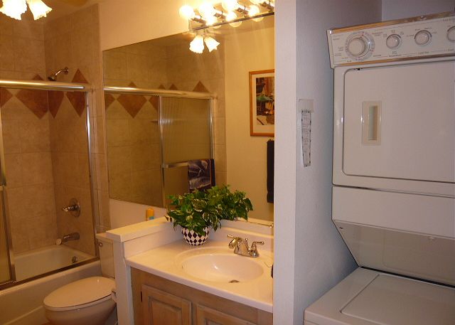 Second bath with large washer/dryer for your convenience.