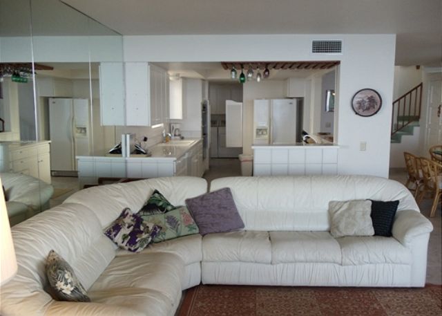 Living room into the kitchen.