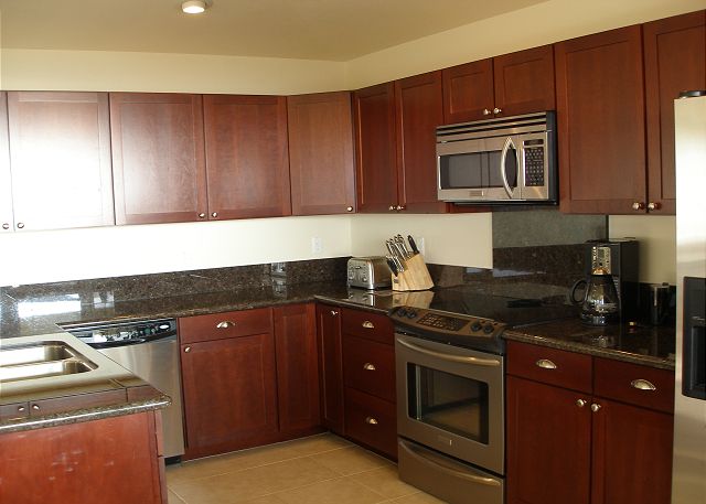 Gourmet kitchen has an ocean view
