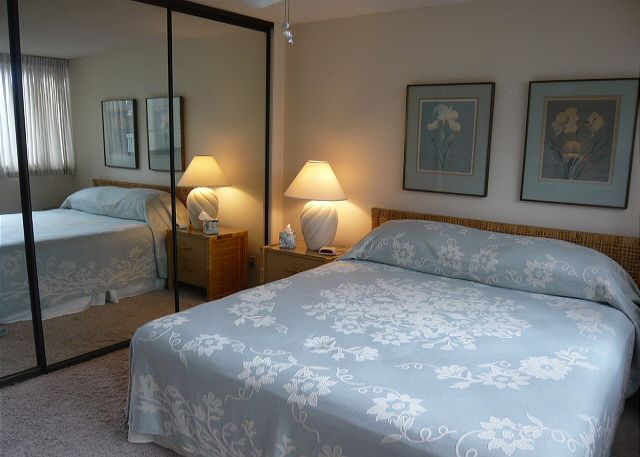 King bed and an ocean view from this bedroom.