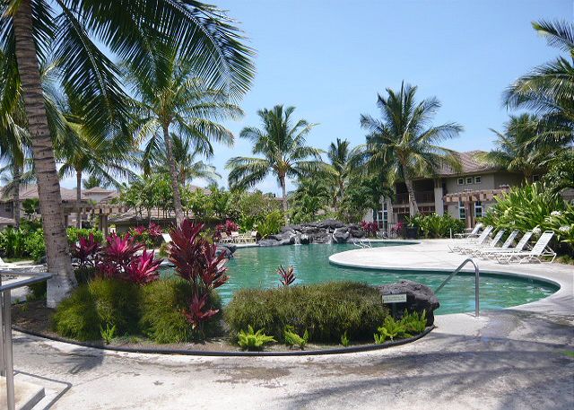 Pool near the tennis court and work-out facility.