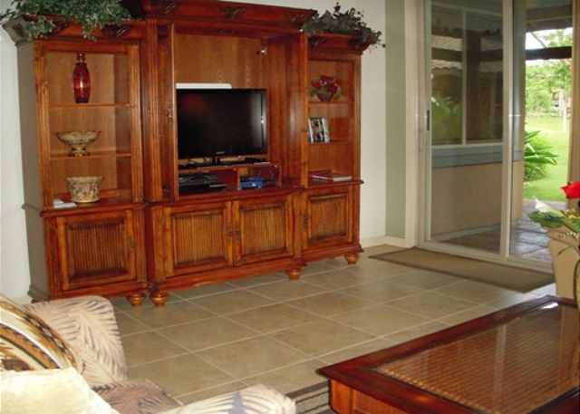 Entertainment center featuring a high-definition LCD  television
