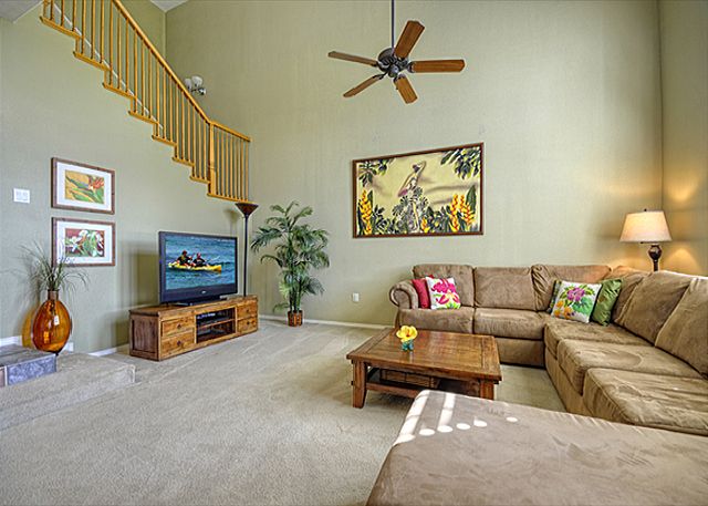 Expansive living room with a golf course view.