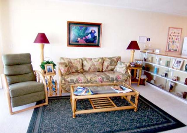 Comfortable living room with a glorious ocean view and breeze.