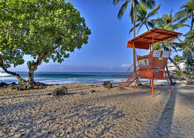 Magic Sands Beach is directly across the street from this 2/2 co