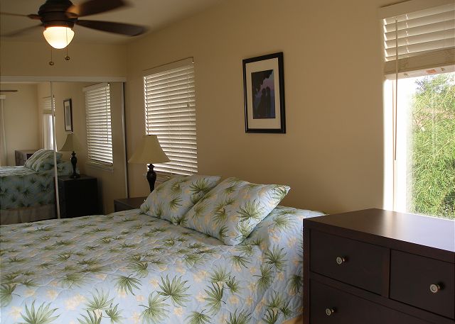 Downstairs bedroom with a private lanai access