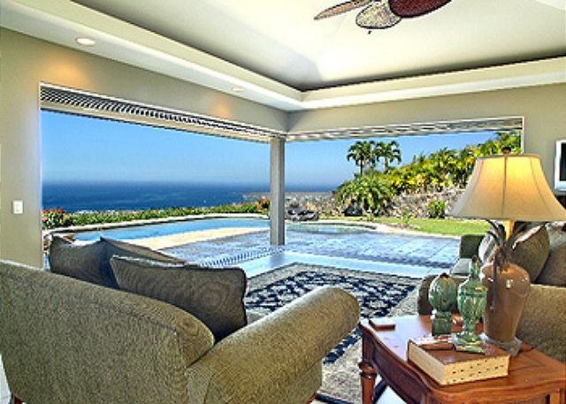 Living room looking across the pool to downtown Kona