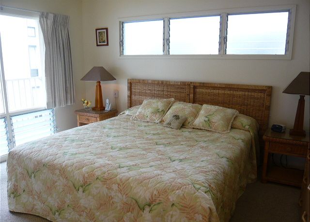 King Bed and an ocean view from the bedroom.