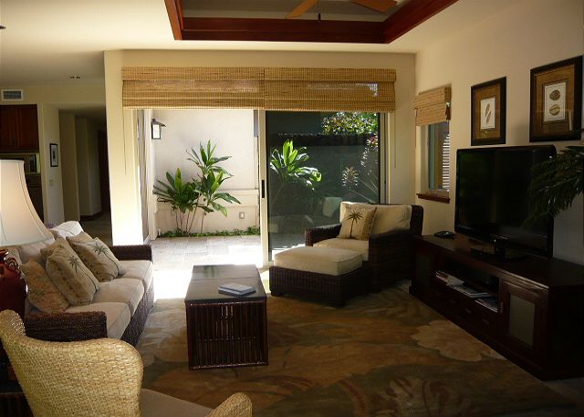 Living Room which was recently furnished, has 2 lanais off the s