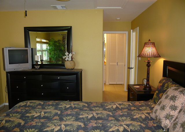 Master bedroom with a king bed.